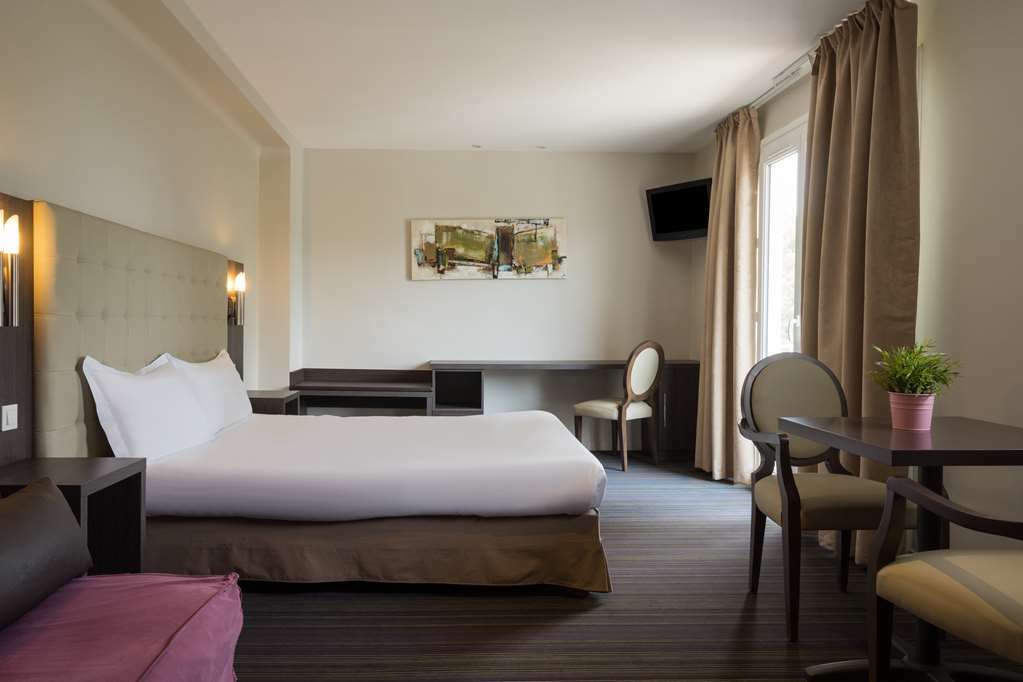 Hotel The Originals Perpignan Sud Le Grillon D'Or Ле-Булу Номер фото